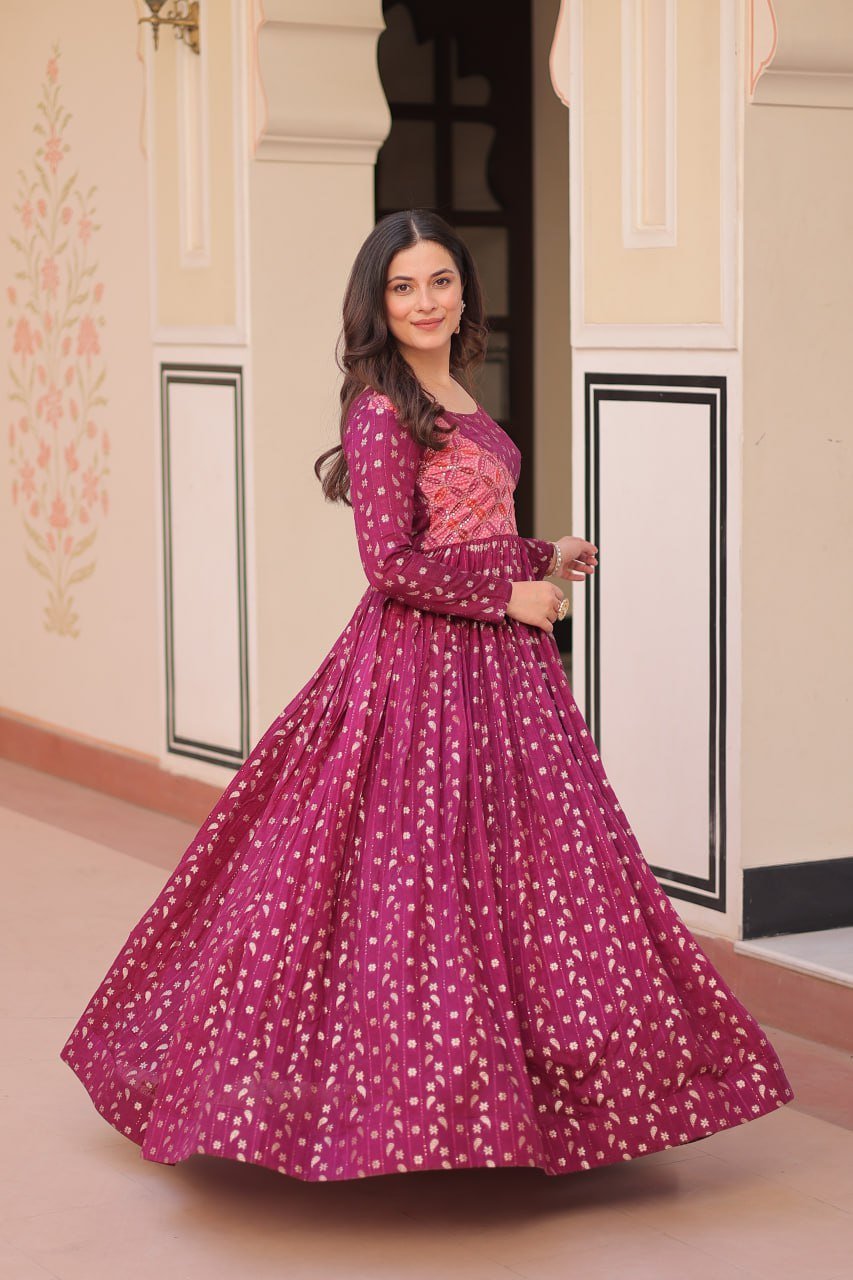 Women’s Festive Berry Purple Printed Anarkali Gown with Intricate Zari Work & Embellished Yoke – Perfect for Traditional & Celebration Wear
